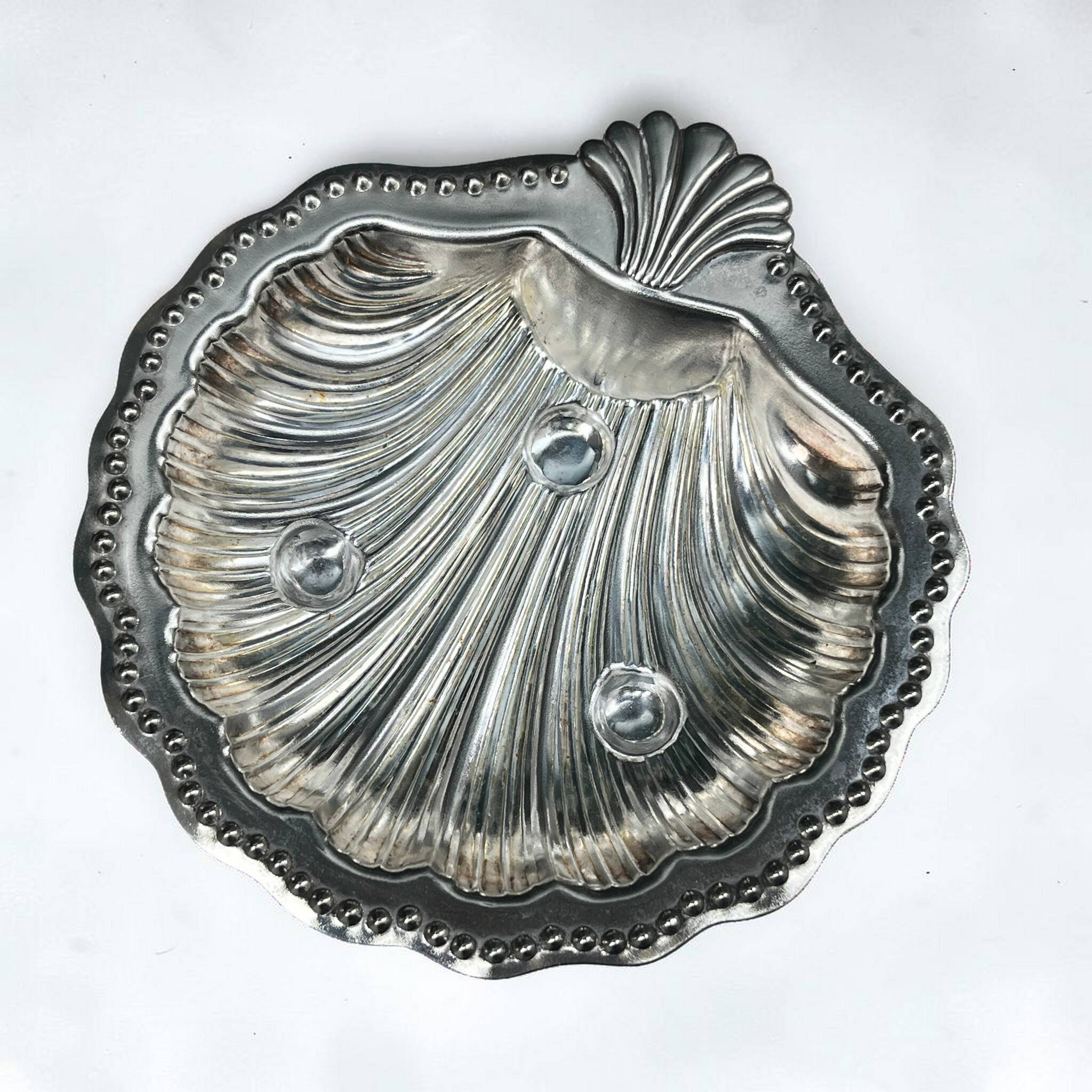 Silver-plated shell butter dish and vintage blue bowl from the 70s.