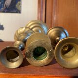 Trio of brass candlesticks