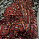 Hand woven flat woven Iraqi artisan rug.