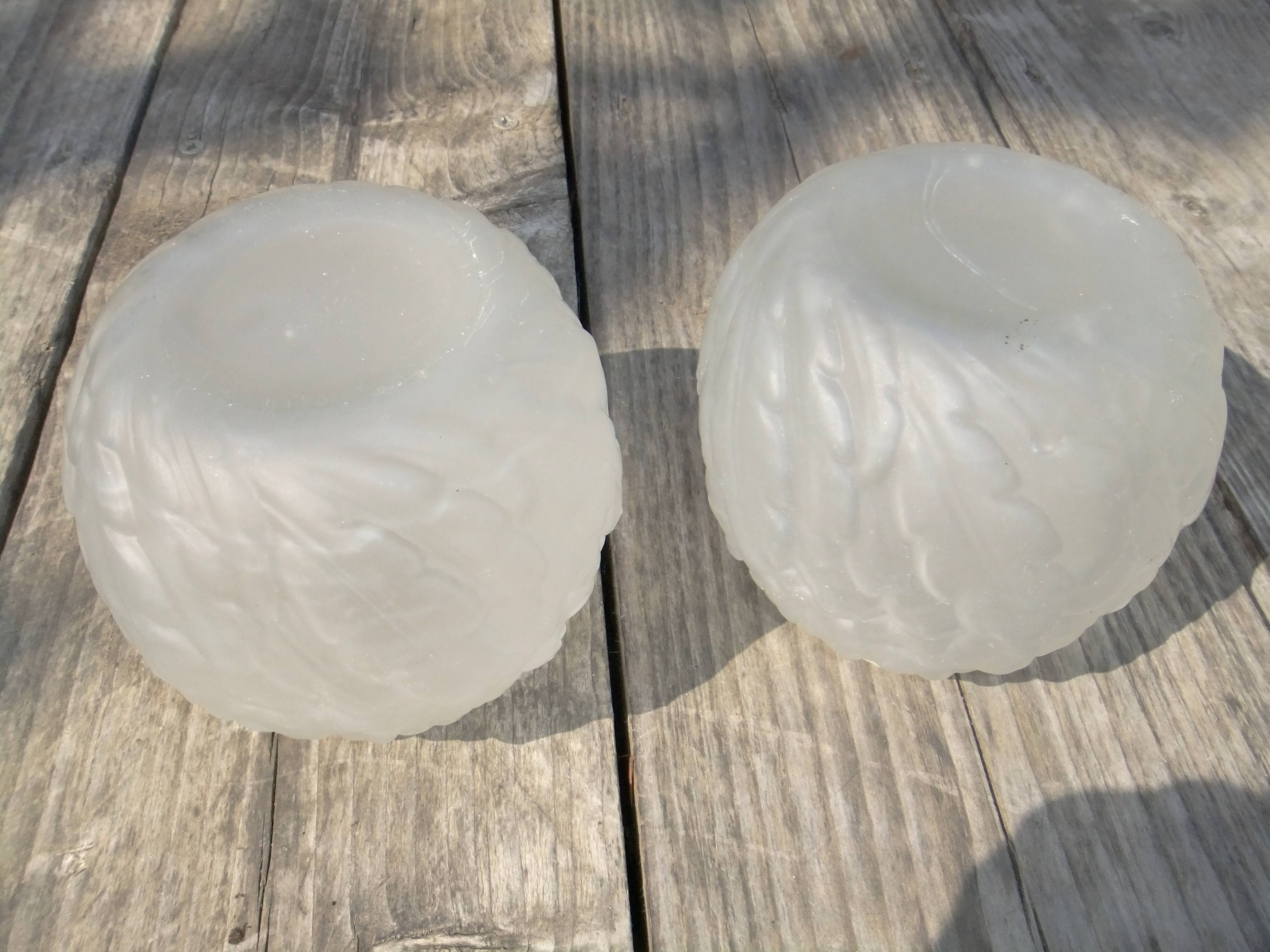 Art Deco ball vase pair with flower and leaf decor