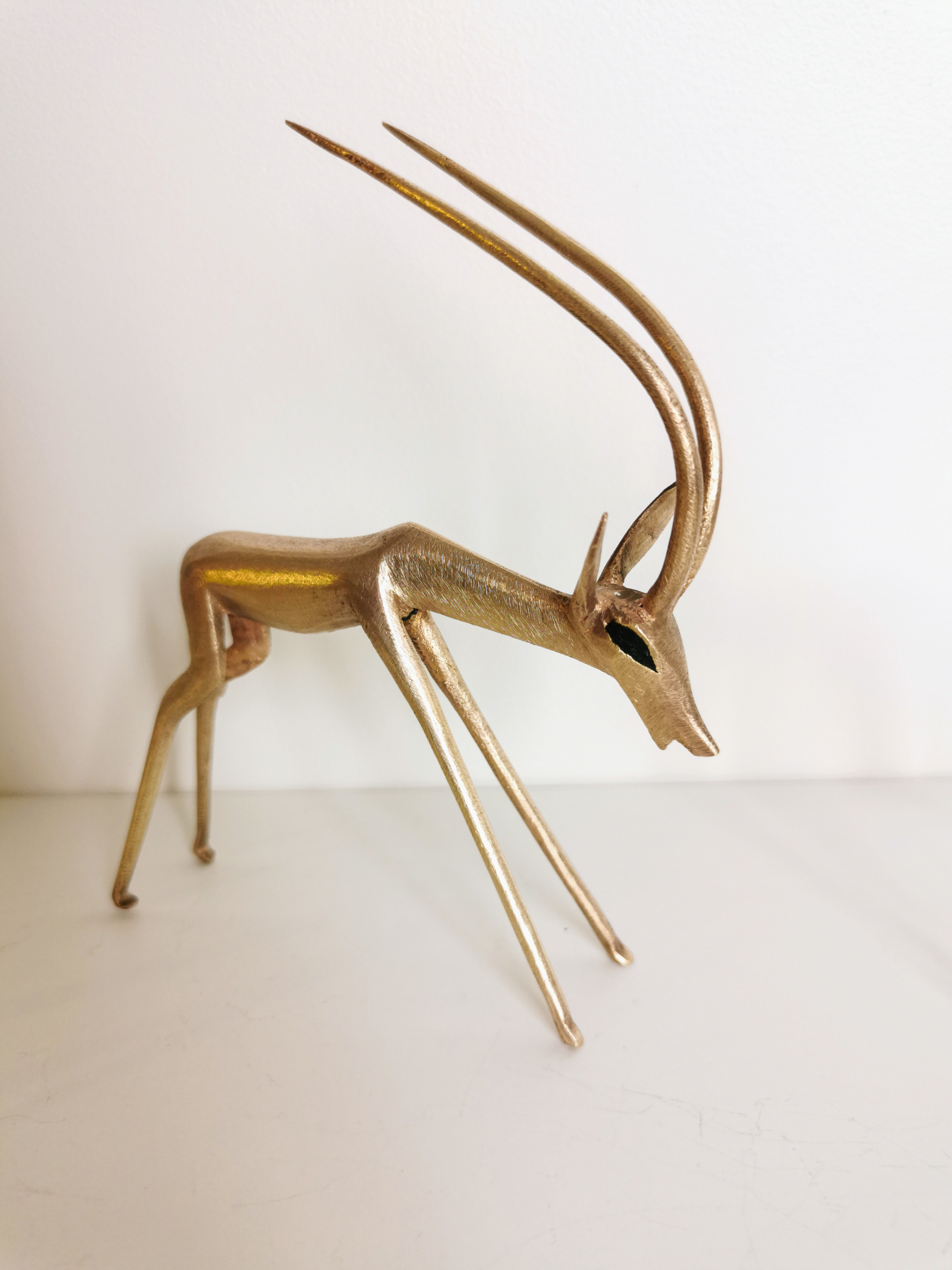 Trio of brass antelopes