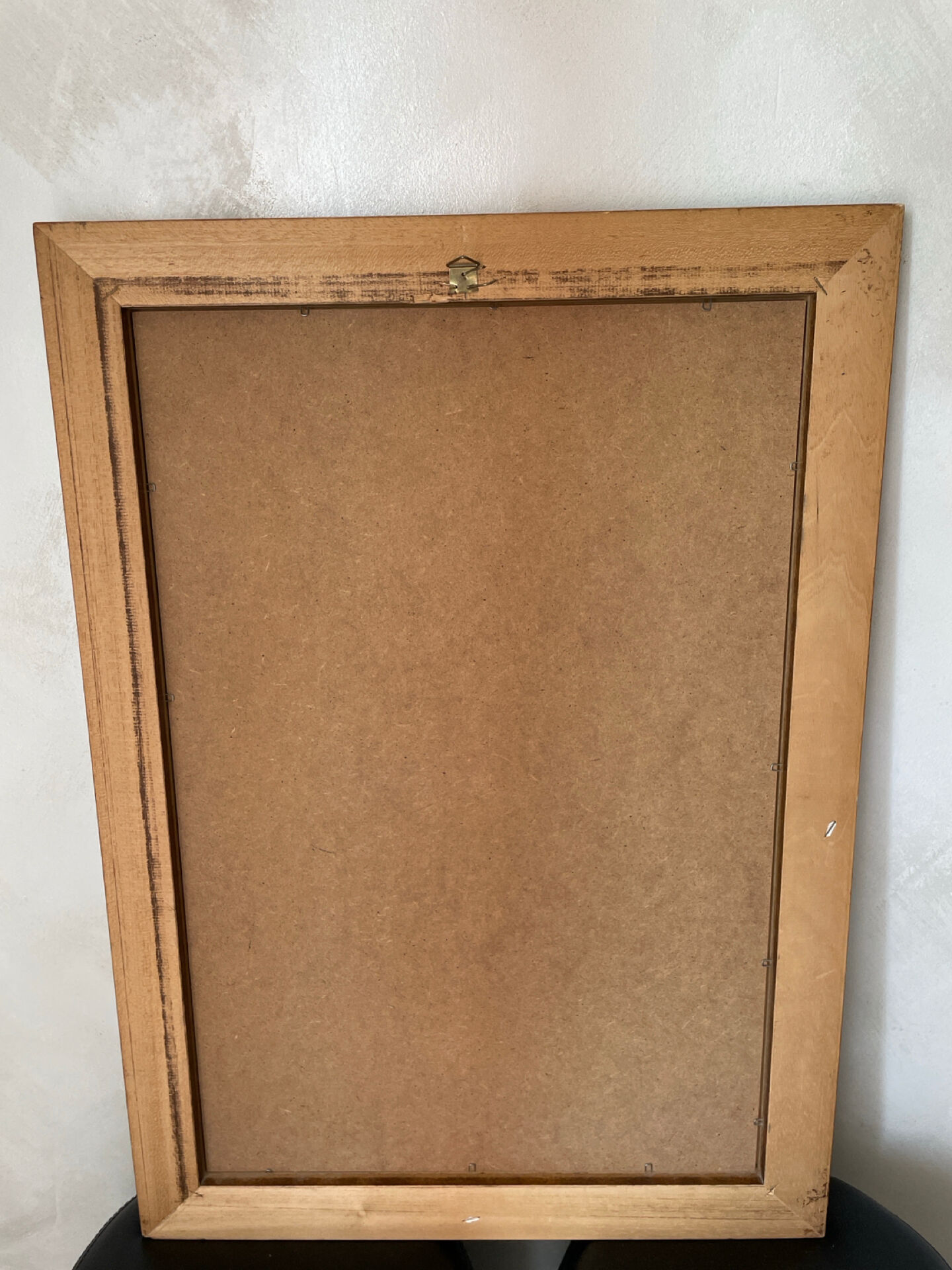 Vintage bevelled wall mirror in stained wood and brass