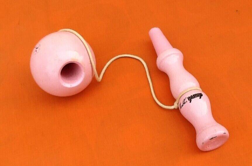 Wooden cup and ball game