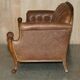 Chesterfield Regency 1810 antique canapé restored in leather with a carved frame.