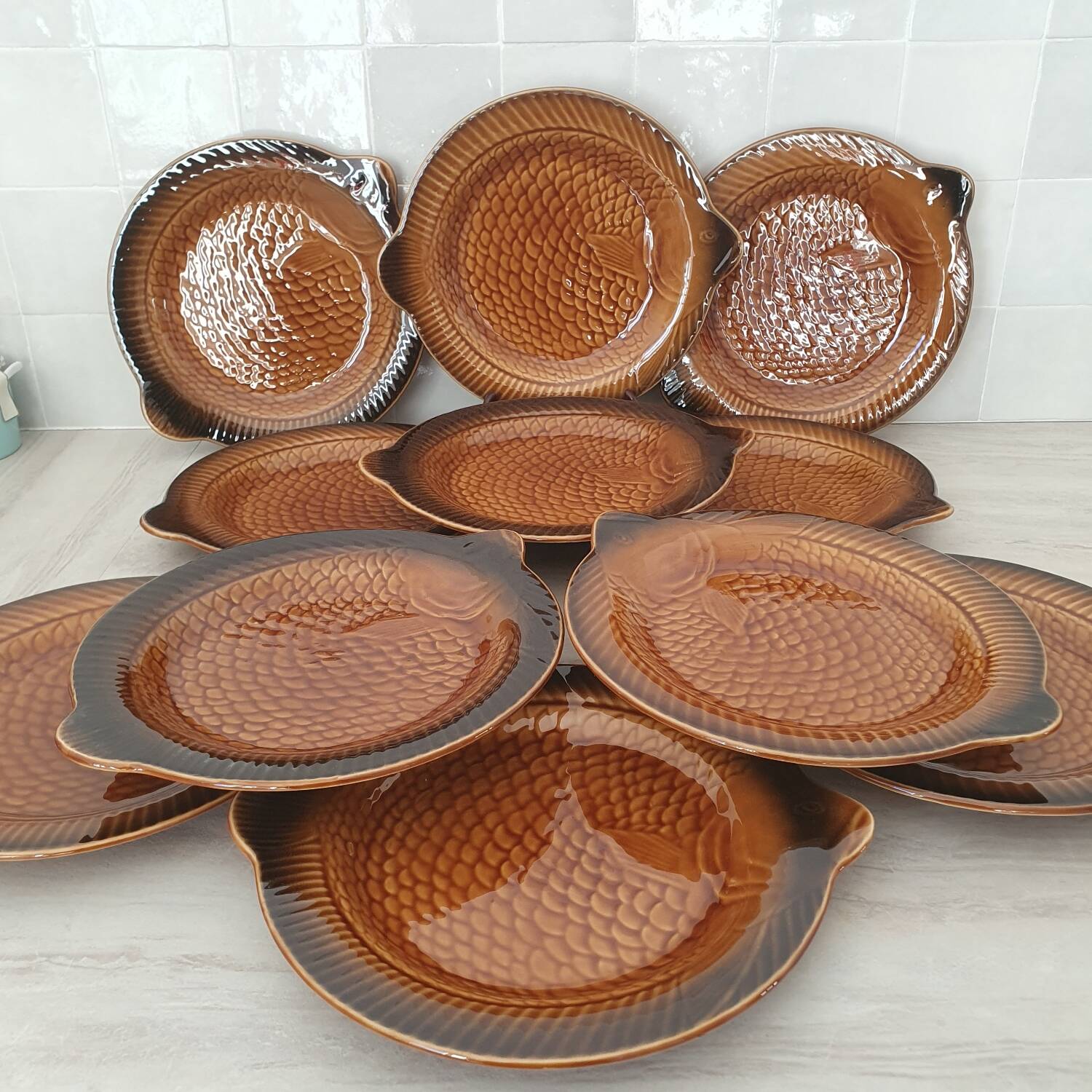Sarreguemines / 11 earthenware fish-shaped plates
