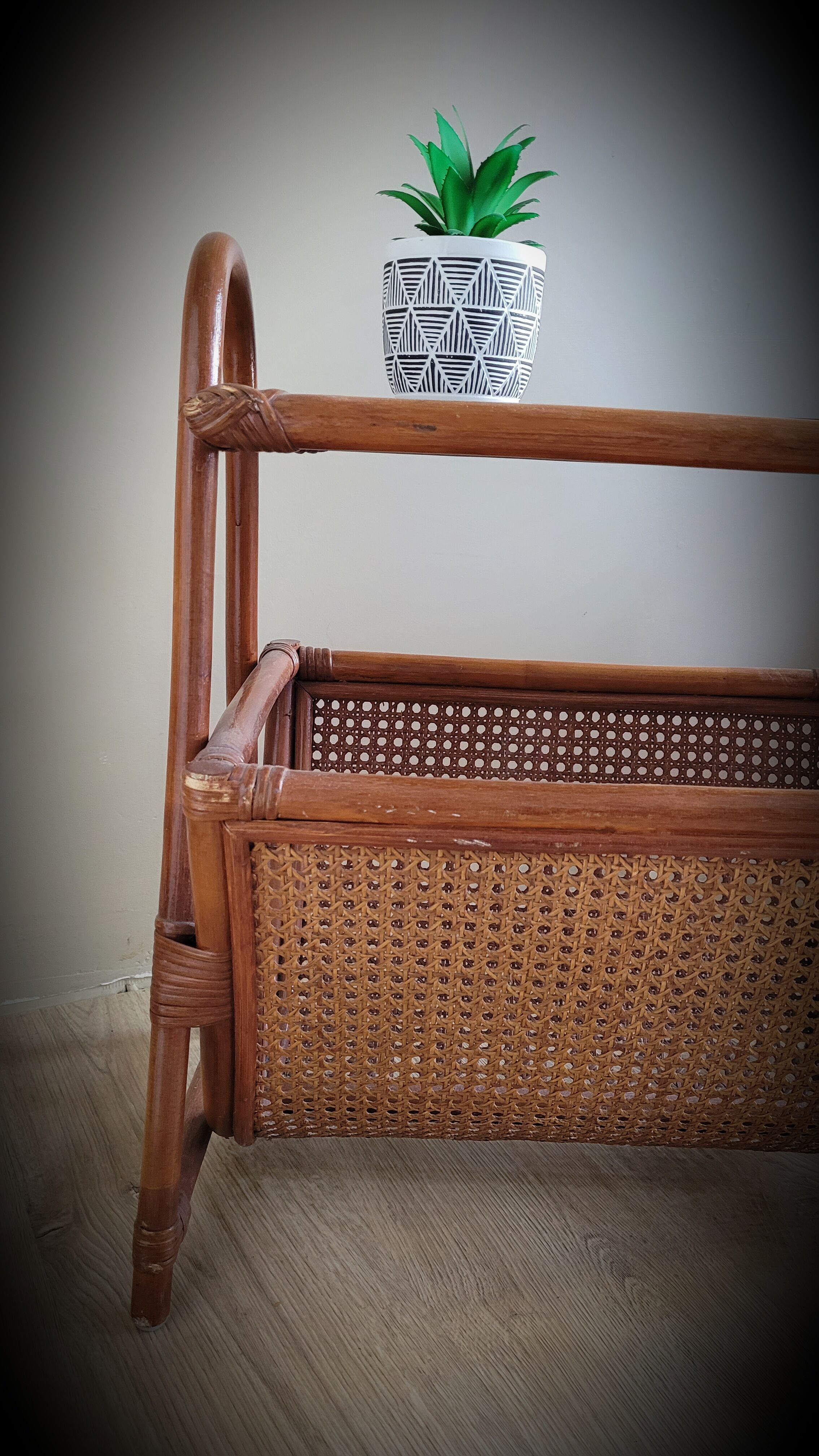 Braided rattan side table and smoked glass