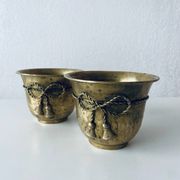 Pair of brass cord pot covers