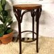 Curved wooden bar stool and cannage