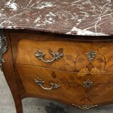 Curved and inlaid Louis XV style chest of drawers