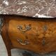 Commode galbée et marquetée style Louis XV