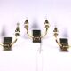 Three double wall lamps  Brass and lucite, France Mid-Century