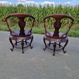 Pair of antique Chinese carved mahogany armchairs, circa 1960s