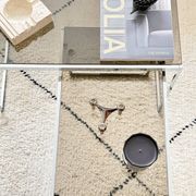 Set of 2 vintage nesting coffee tables in chrome metal and smoked glass.