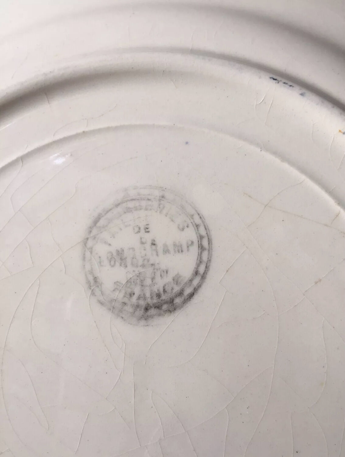 Set of 4 Longchamp Terre de fer plates with flower decoration