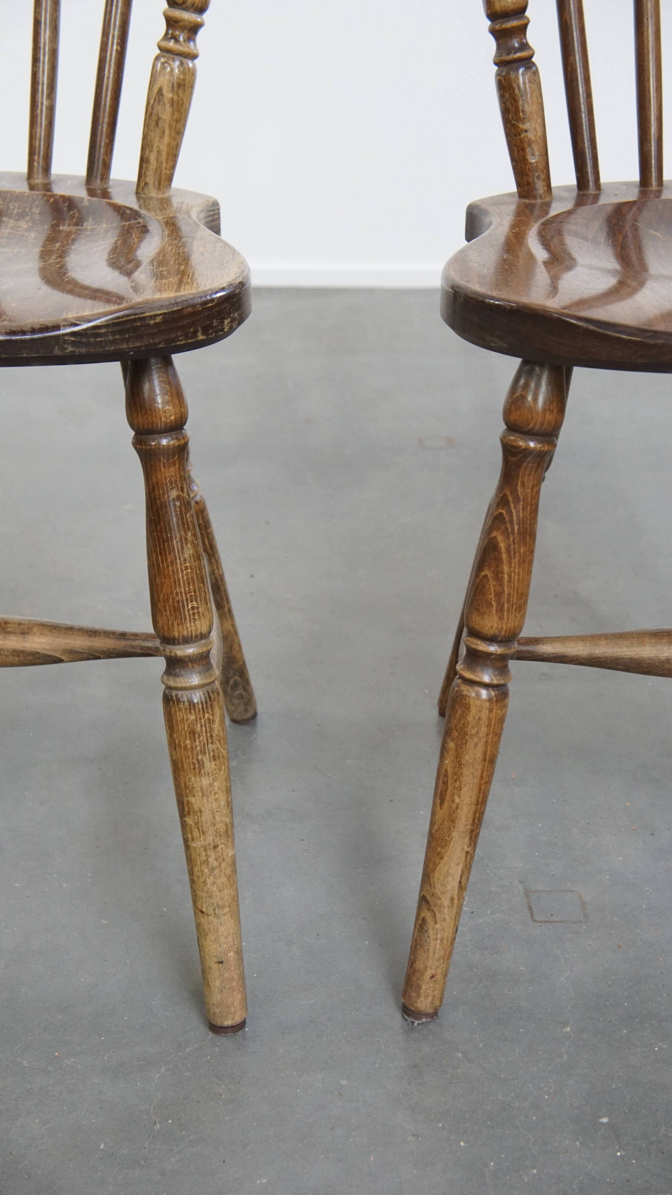 Set of 8 antique wooden spindle chairs