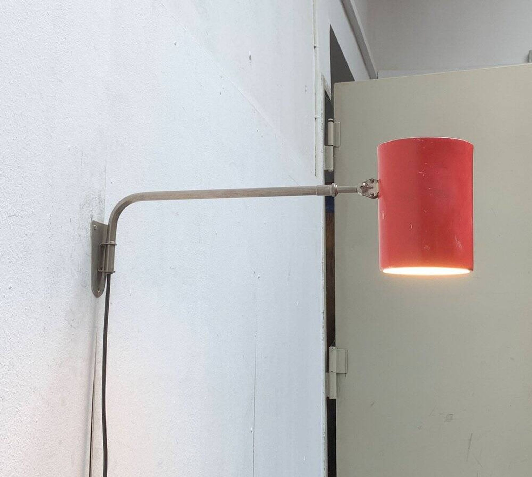 German minimalist wall lamp from the mid-century by Hala, 1960s.