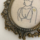 Broderie encadrée