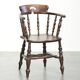 Wooden English antique pub/captain chair from the late 19th century