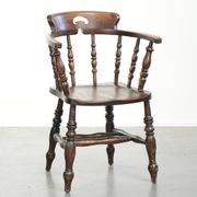Wooden English antique pub/captain chair from the late 19th century