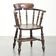 Wooden English antique pub/captain chair from the late 19th century