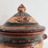 Vintage covered pot with boat décor