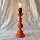 Large vintage lamp base in orange lacquered wood