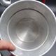 Ancienne cafetière en aluminium - anse rouge - vers 1930