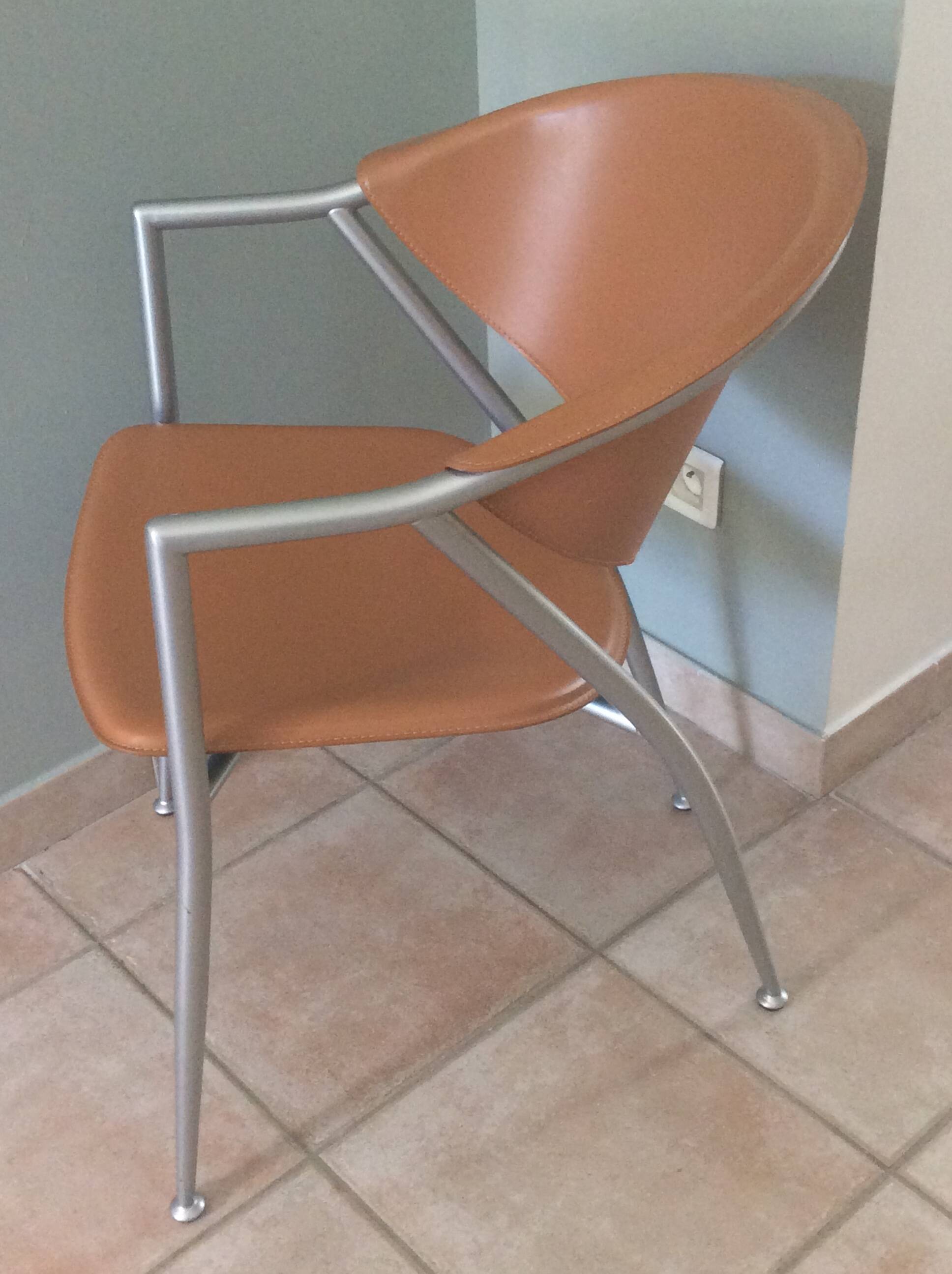 Leather and metal armchairs