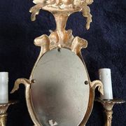 Pair of wall sconces with mirrors. Putti. Bronze. Floral Art Nouveau.