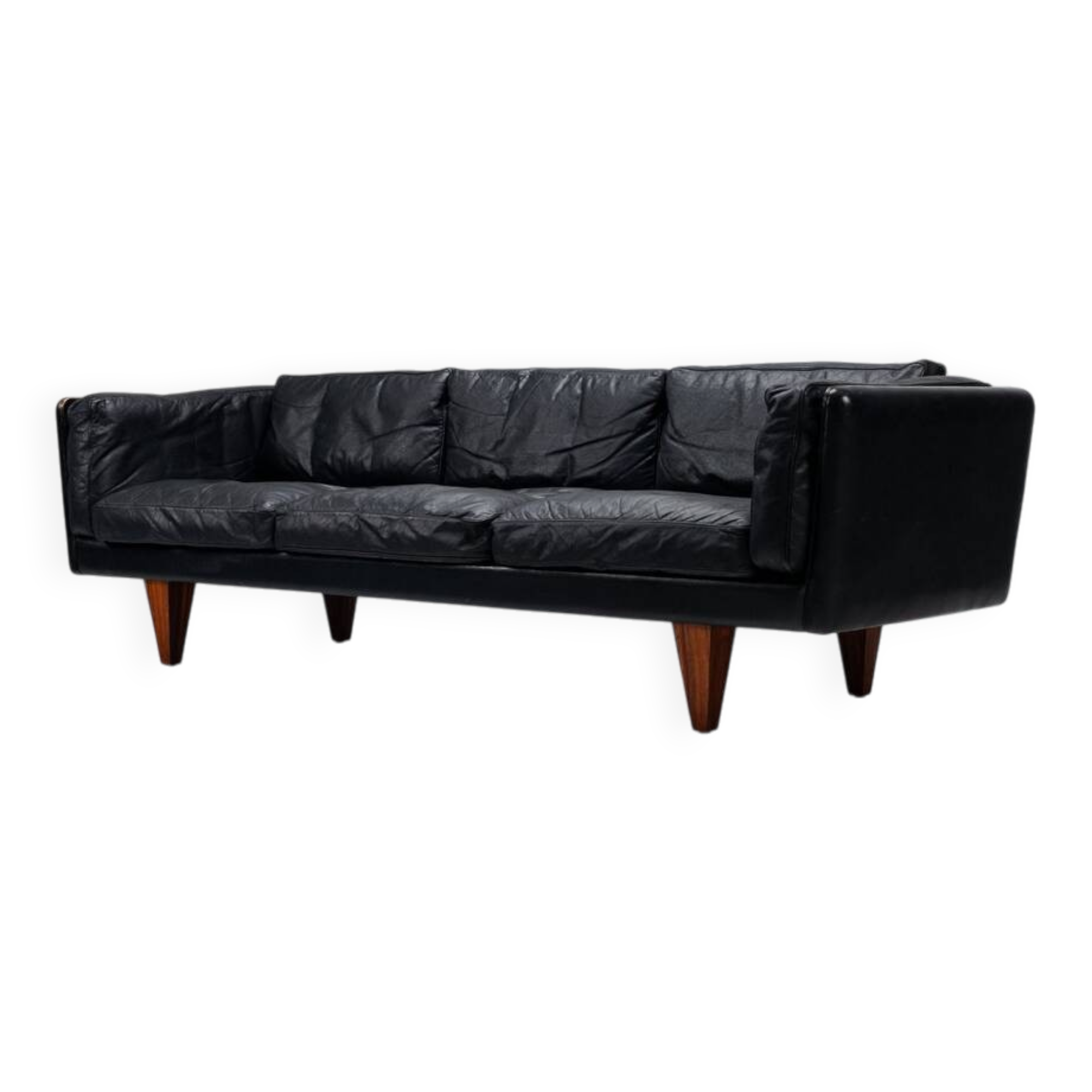 Illum Wikkelso model V11 sofa in black leather by Holger Christiansen, Denmark, 1960