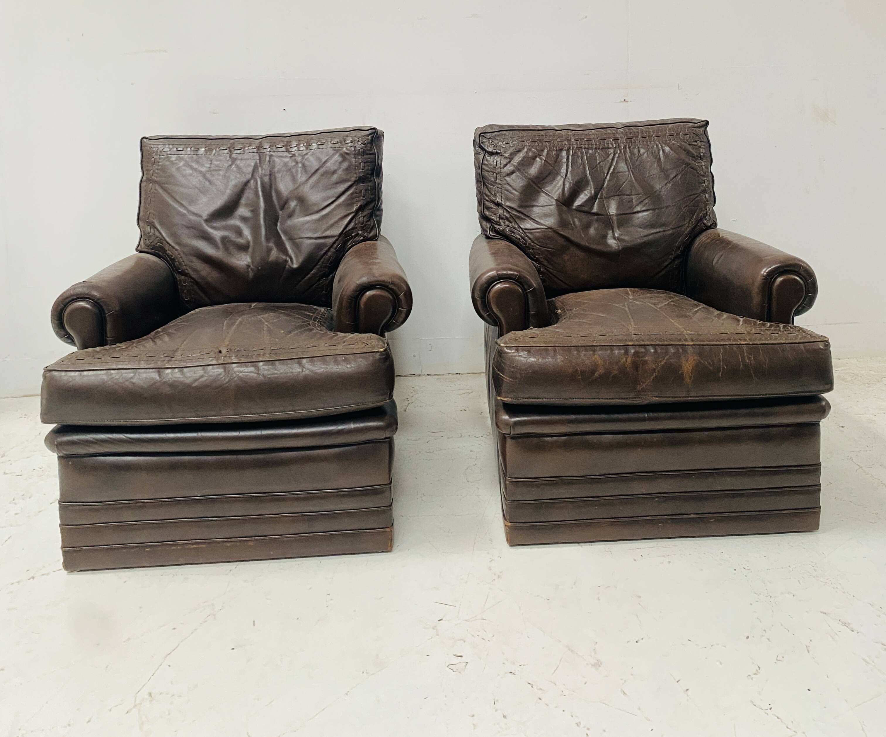 Pair of vintage brown leather armchairs from the 1970s.