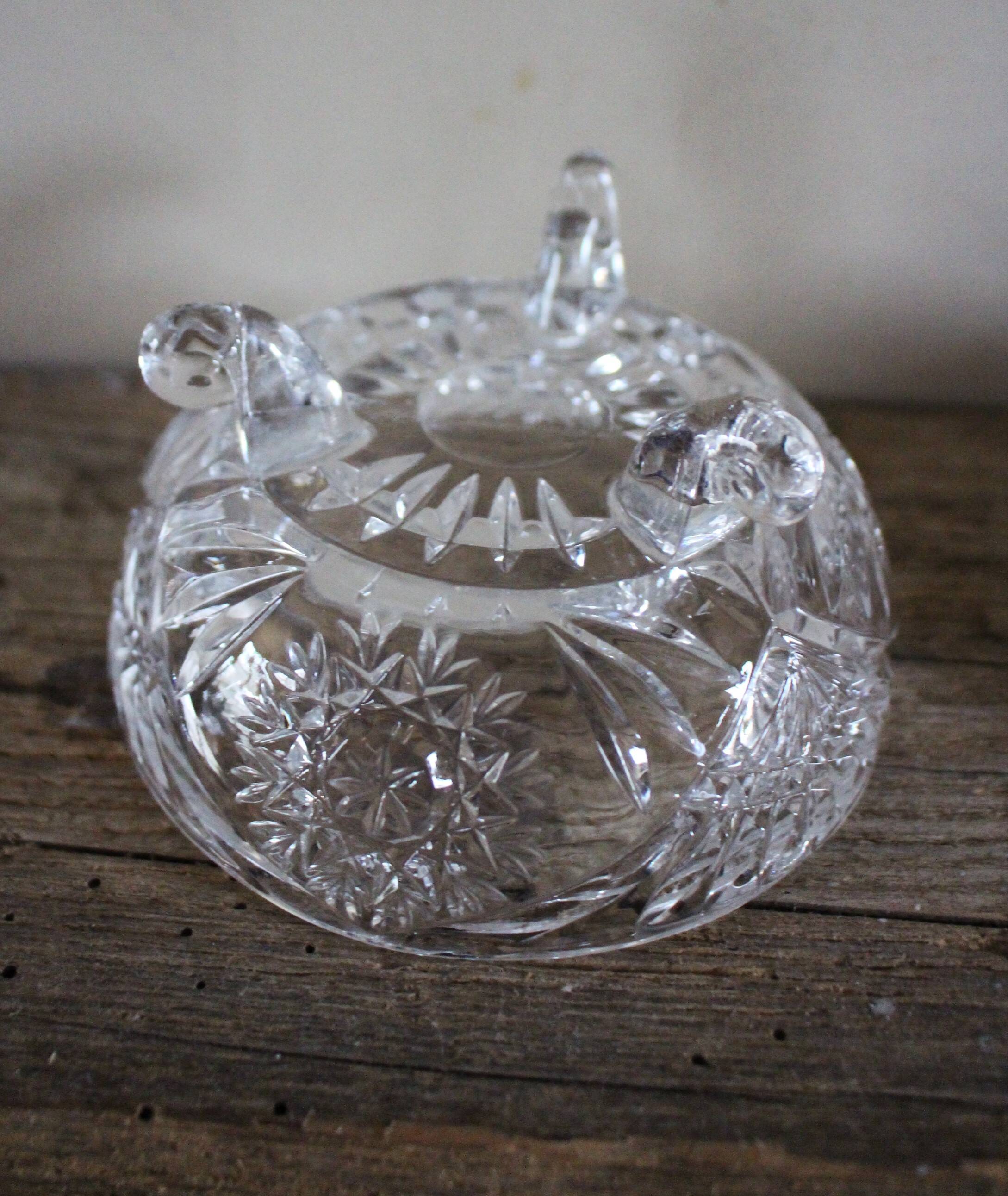 Cut glass sugar bowl on a stand