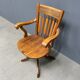 Antique American oak office chair with armrests 1920s