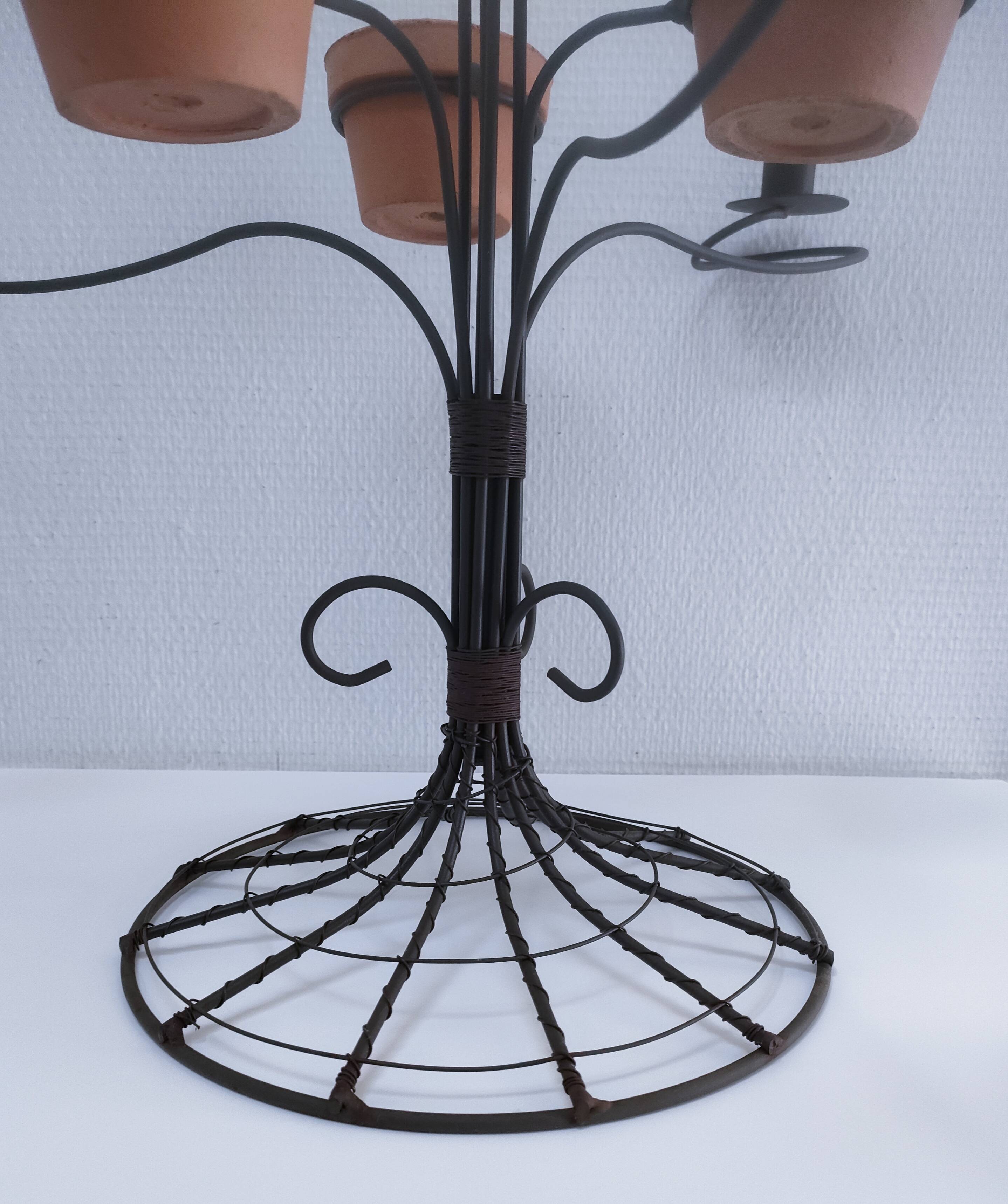 Vintage seven-light terracotta metal candlestick