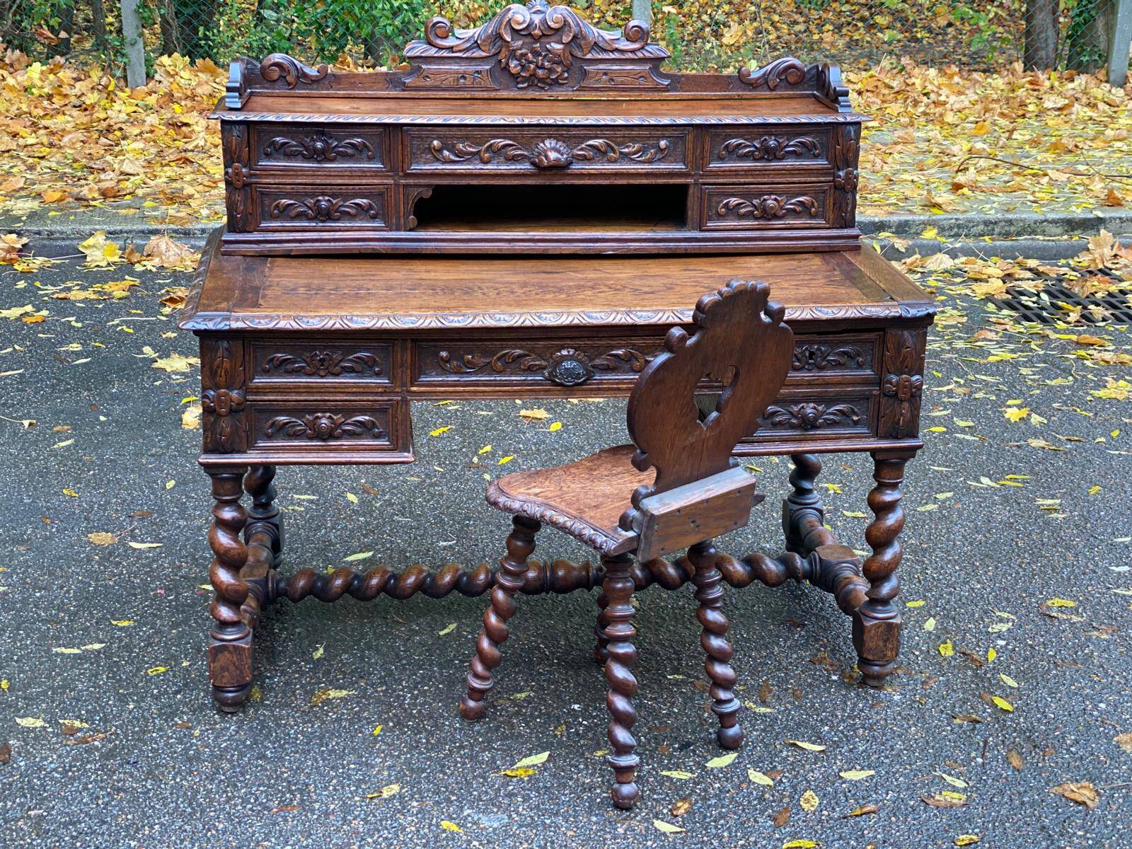 19th-century Renaissance carved oak desk with chair