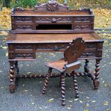19th-century Renaissance carved oak desk with chair