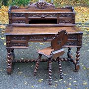 19th-century Renaissance carved oak desk with chair