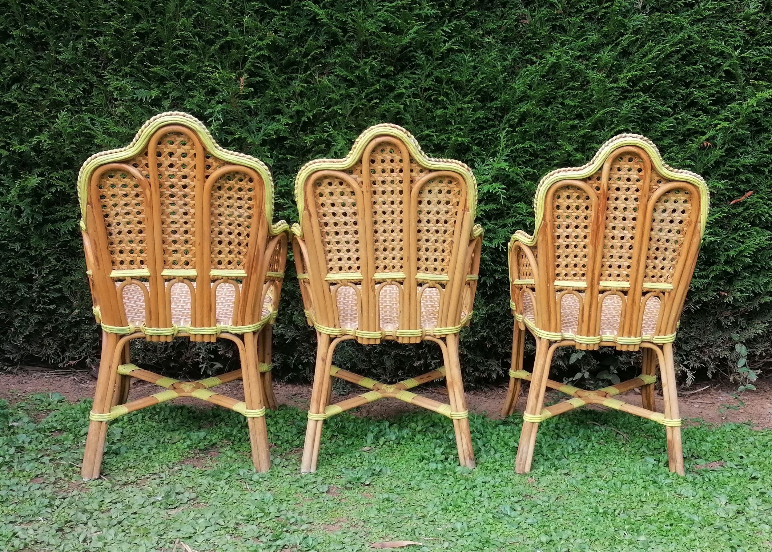 3 woven rattan armchairs