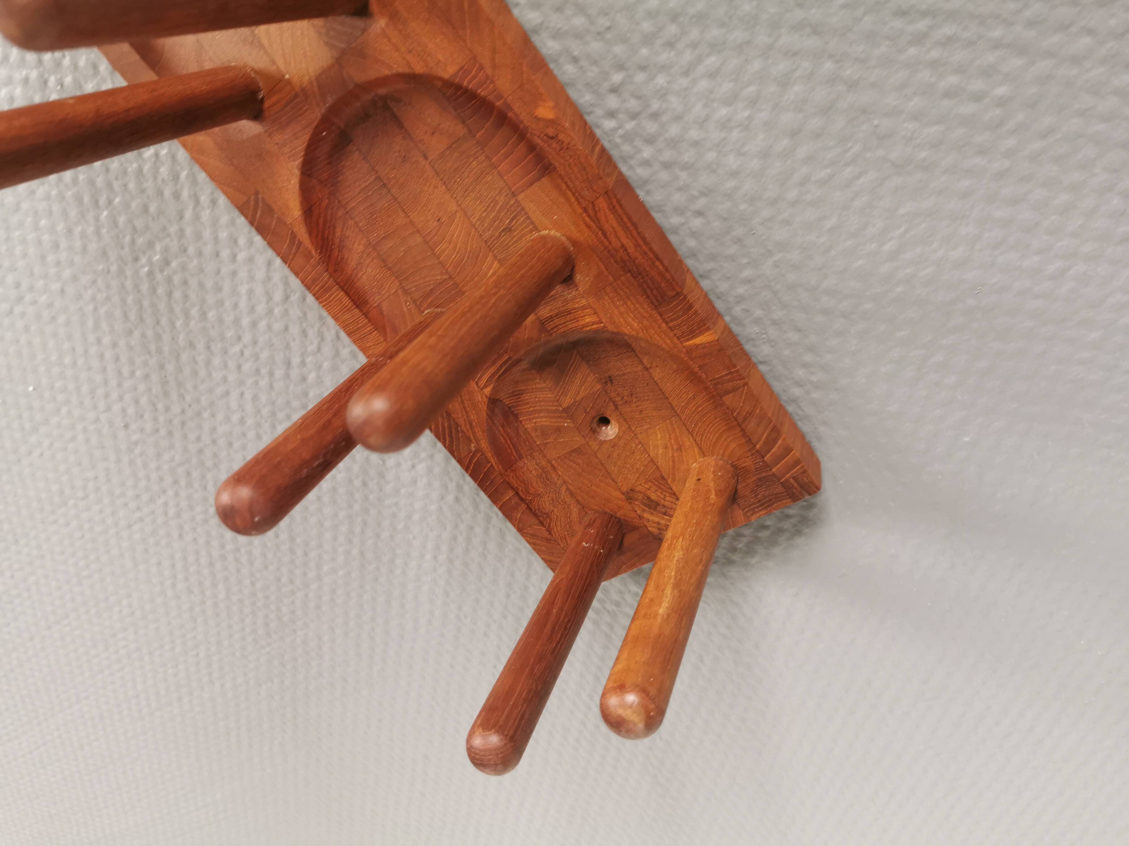 Beautiful Danish wine rack/holder for 3 bottles of wine on the wall. 1980s