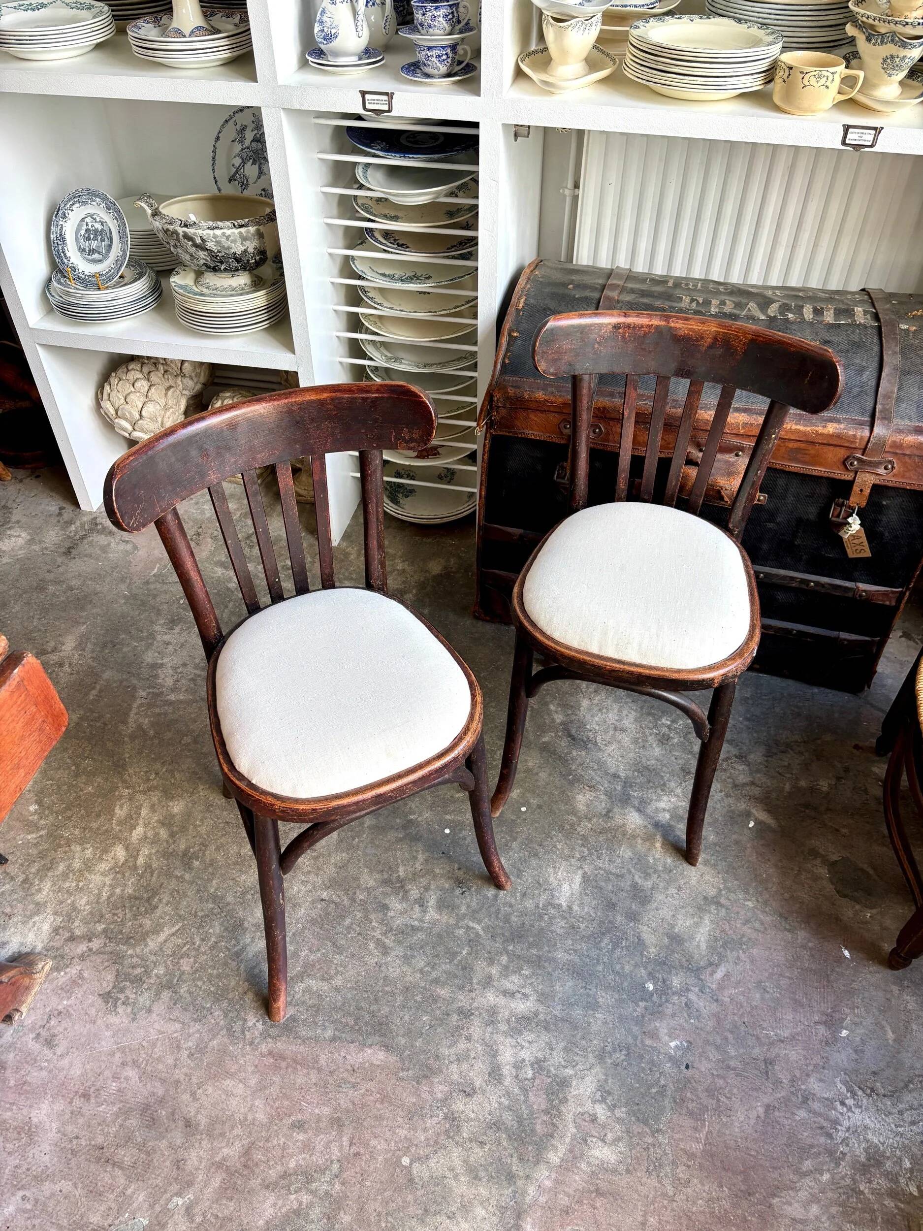 Bistro chair in bent beech and beige mixed fabric.