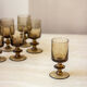 6 glasses in smoked glass foot