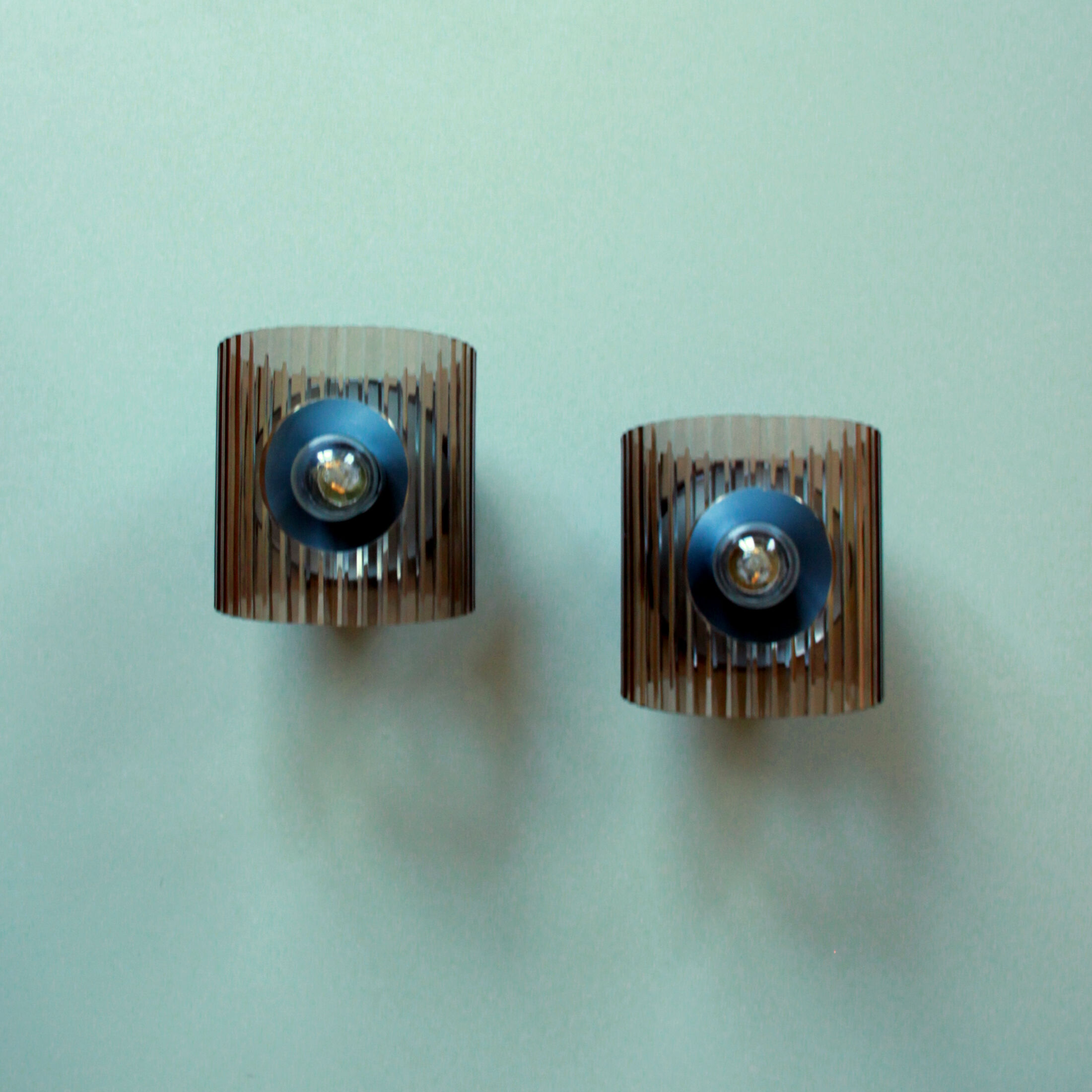 Pair of wall sconces in plexiglass seventies vintage