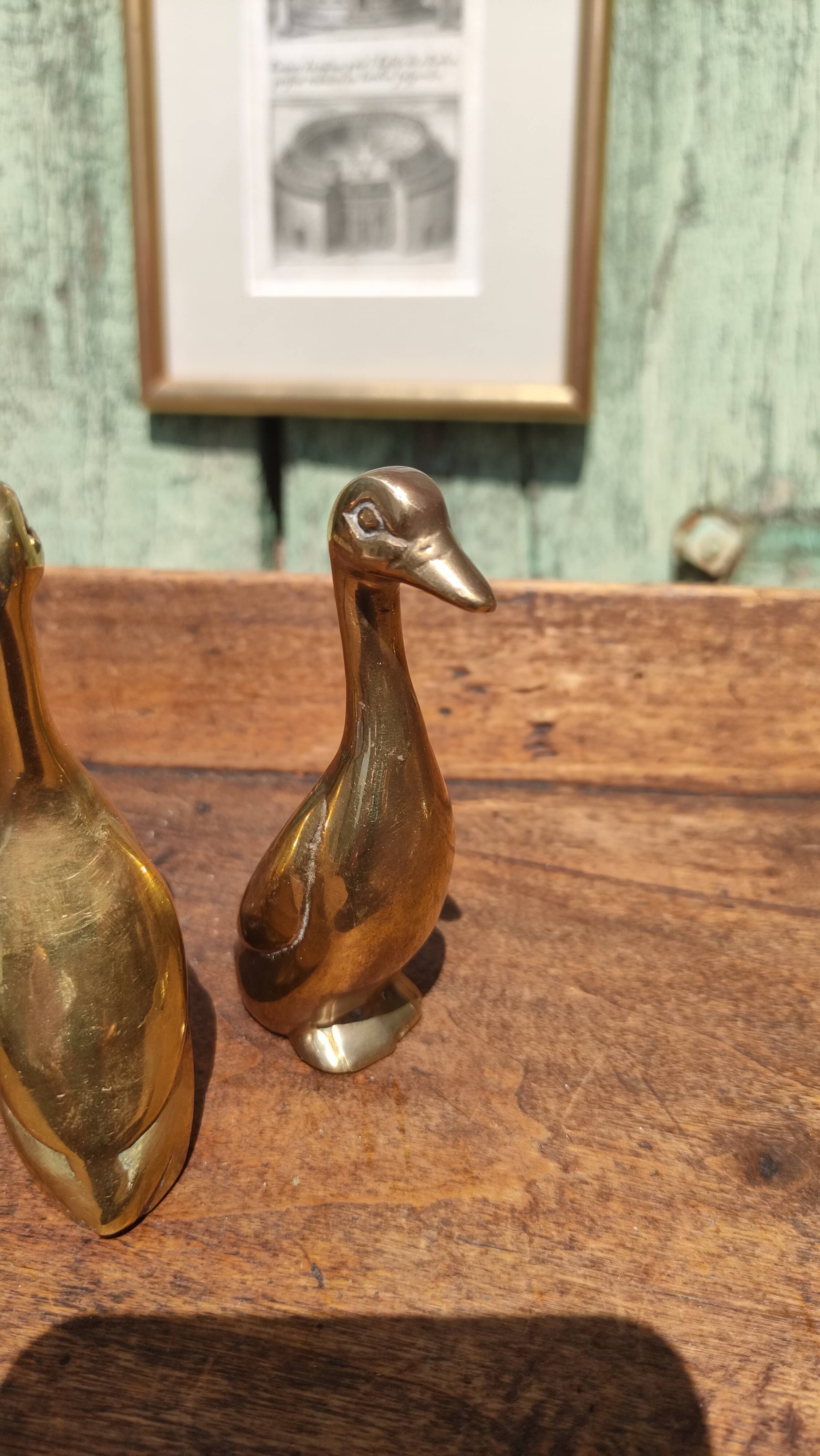 Pair of golden brass ducks