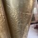 Antique repoussé brass umbrella stand