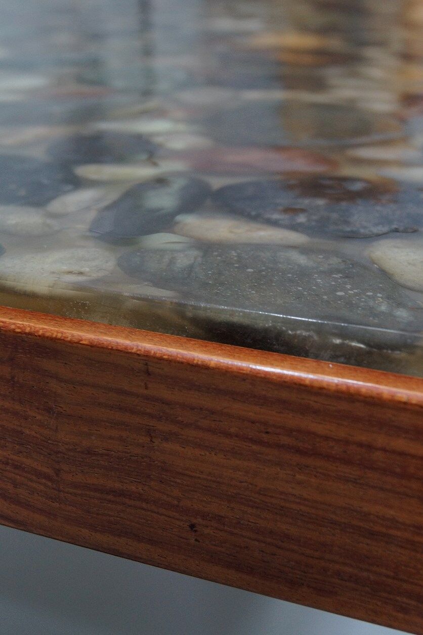 Swedish rosewood and pebbles coffee table in the style of Ib Kofod-Larsen , 1960s