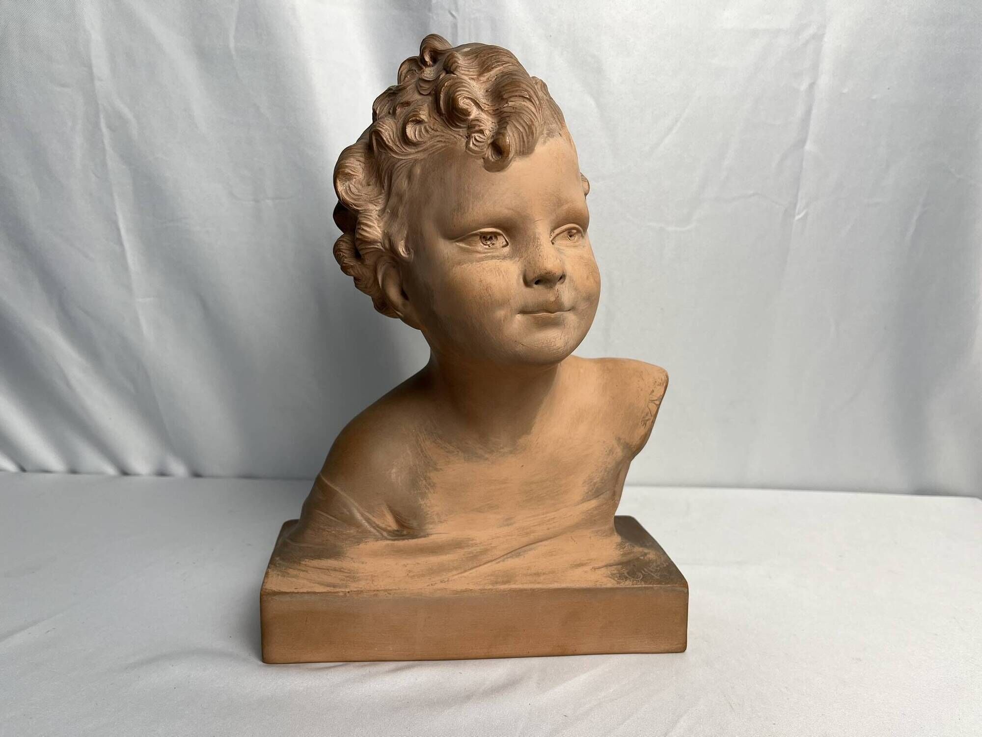 Cipriani, child bust in terracotta art signed 20th century