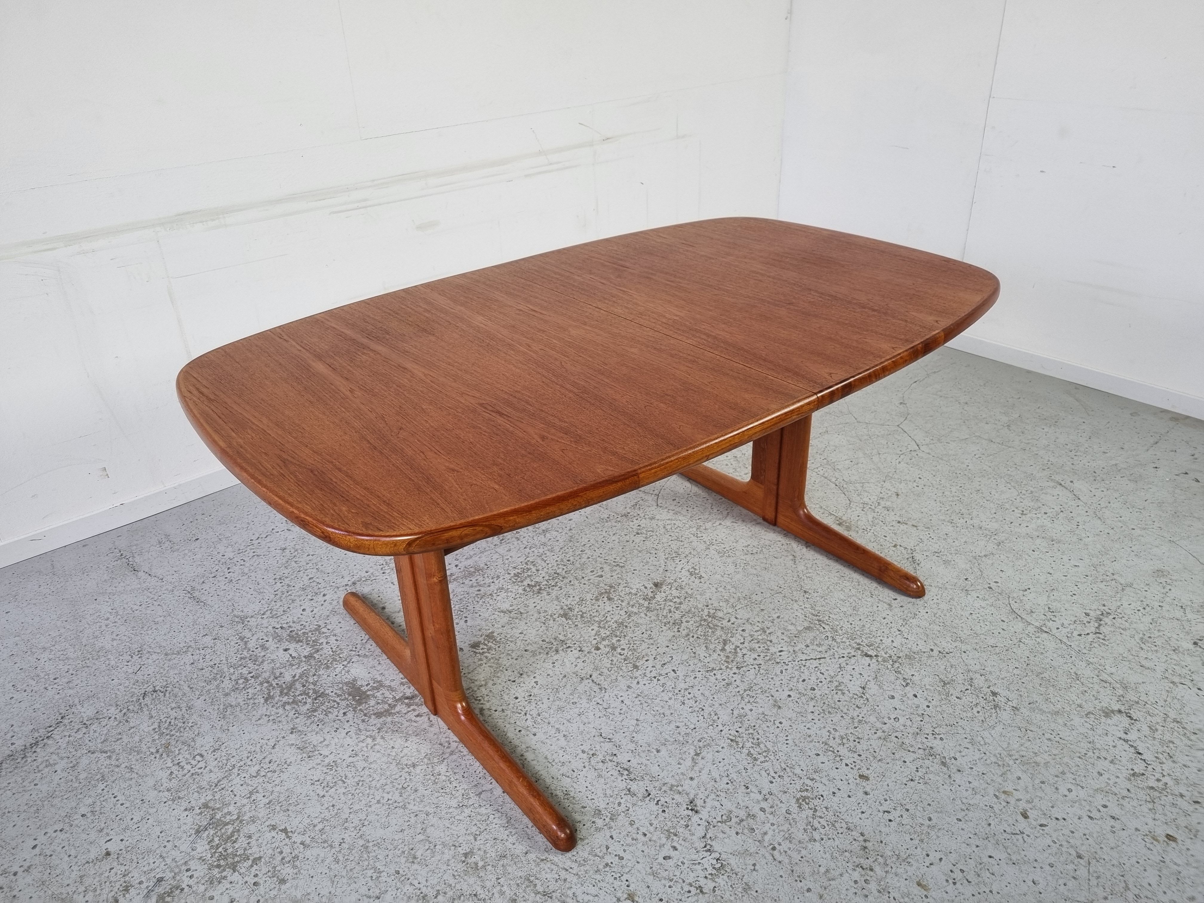 Extendable teak dining table from Dyrlund, Denmark 60s