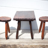 Set of coffee table and 2 carved wooden stools, brutalist