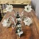 Pair of wall sconces with 2 light arms