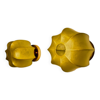 Pair of circular "cocoon" wall lights, resin and pine, Italy, 1970